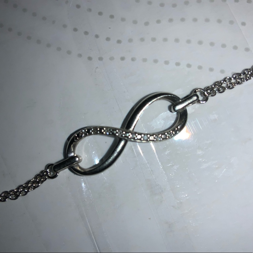 JARED JEWELRY sterling silver an diamonds 8 inch’s long.  Lobster claw clasp.